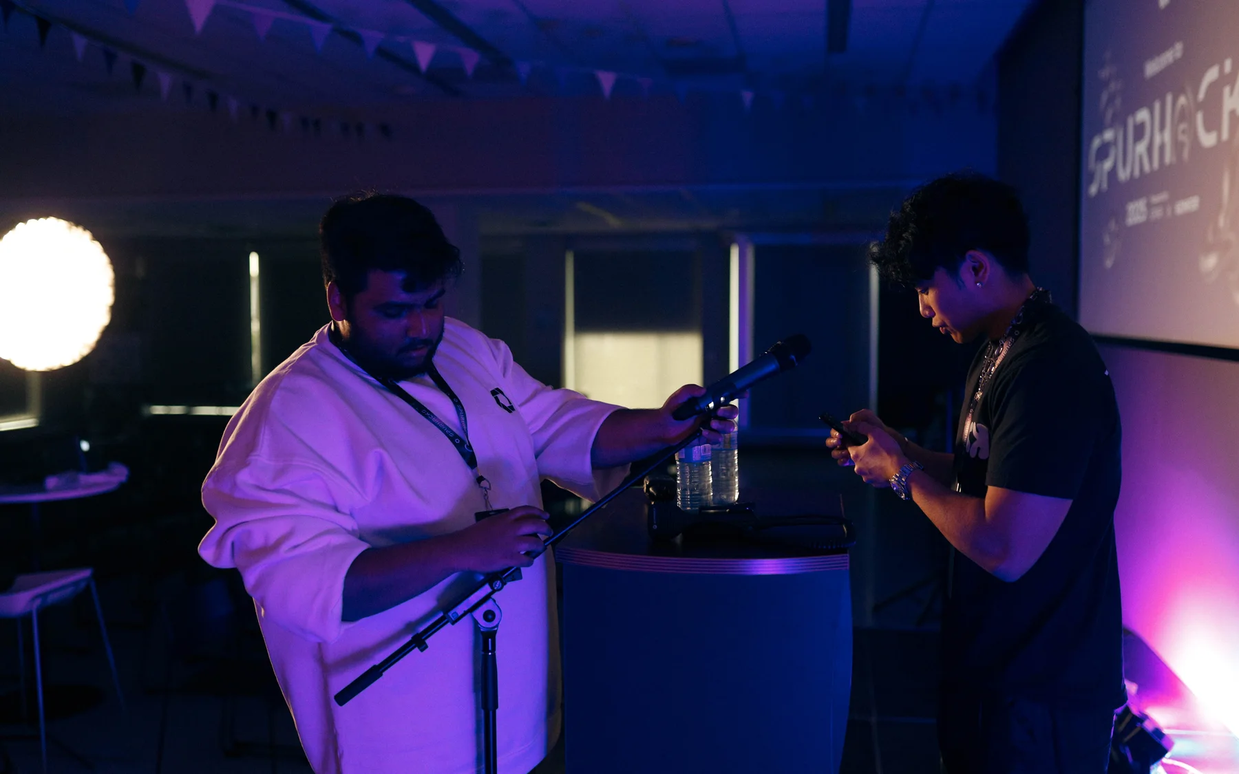 CK crew preparing stage audio before a live program