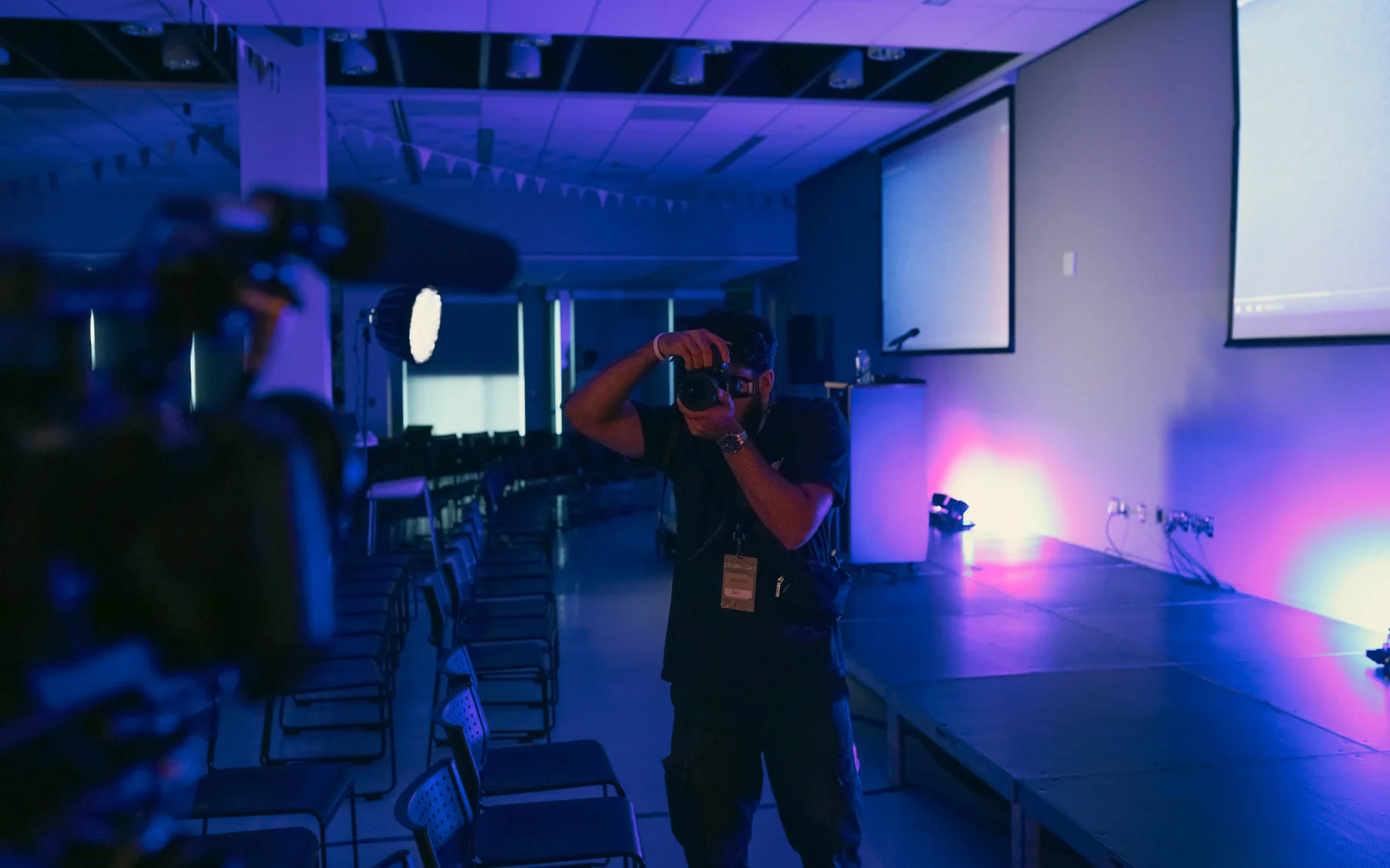 CK photographer covering a live event on location