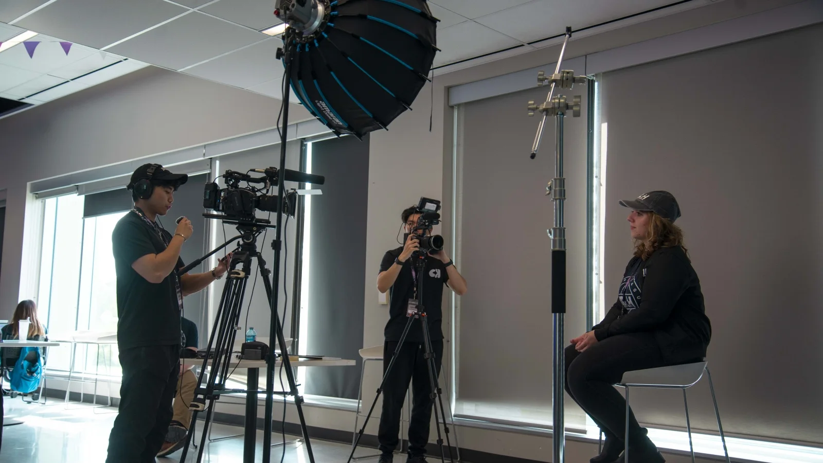 A CK crew filming a clinician inside a dental practice