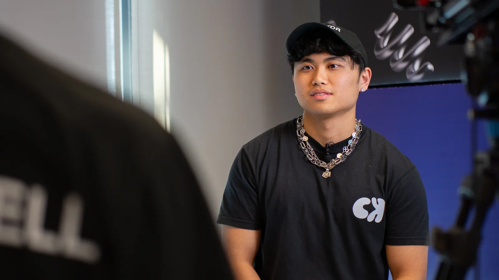 A creator speaking naturally during a professional interview