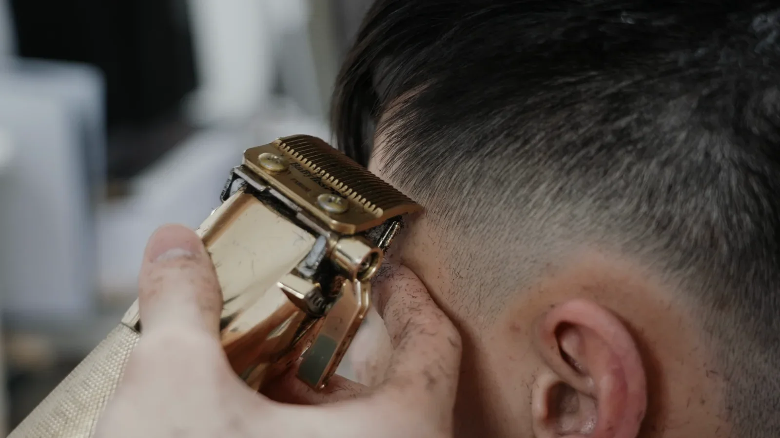 A barber creating a precise transformation for short-form content