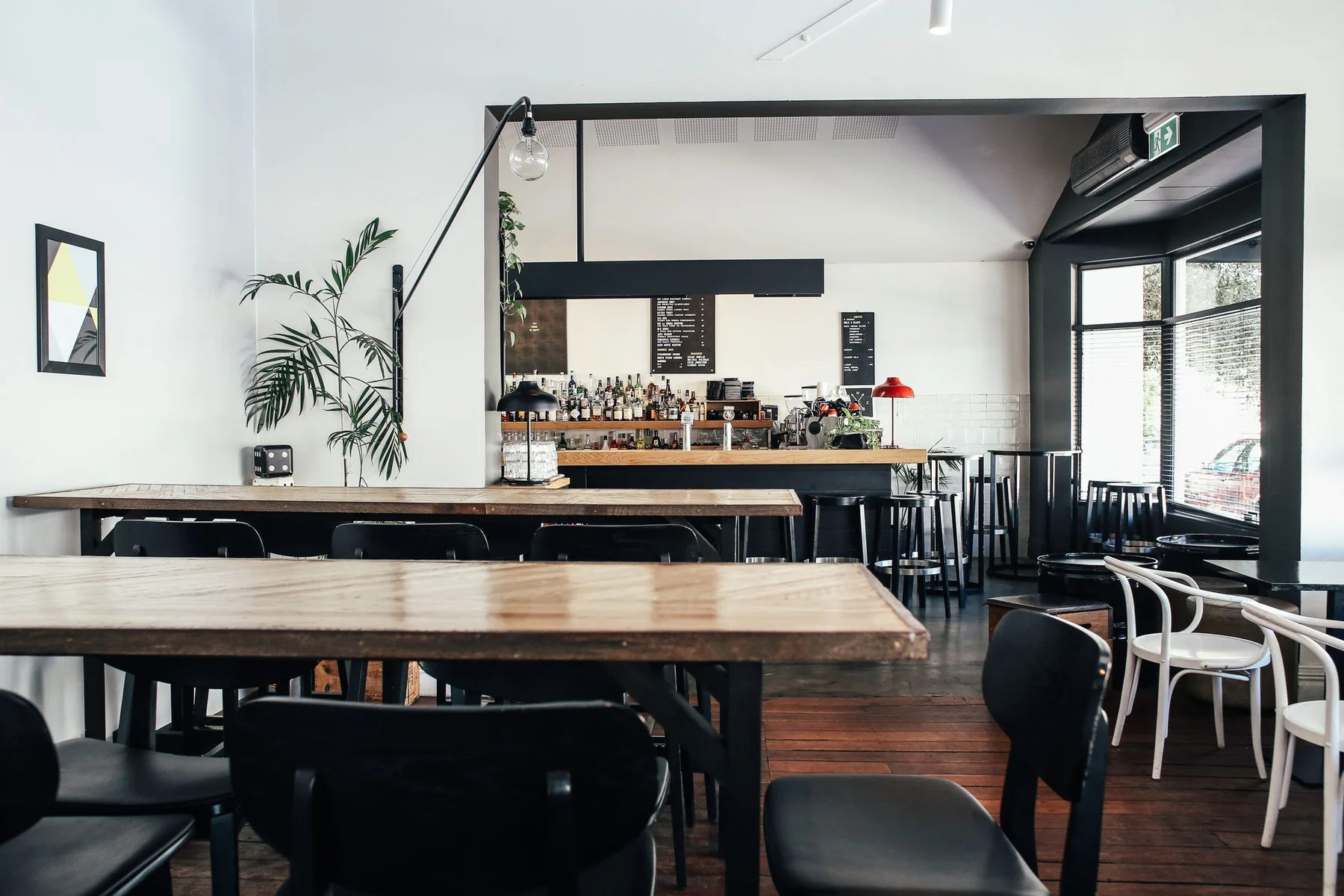 A bright, modern restaurant interior prepared for service